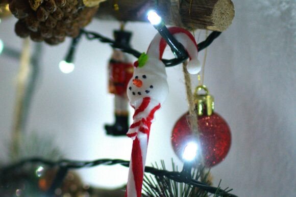 Decorate Your Home with the Adorable Snowman Candy Cane
